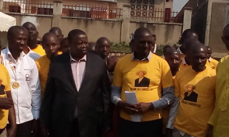 James Birungi Ozo with Min. Kahinda Otafiire and other FDC supporters he defected with