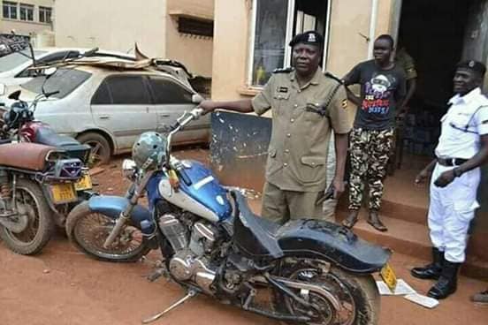 Enanga shows  the bike which Ziggy Wine was riding when he got the accident