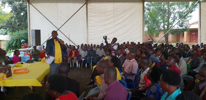 People listening as  Hon. Tumwebaze preached patriotism