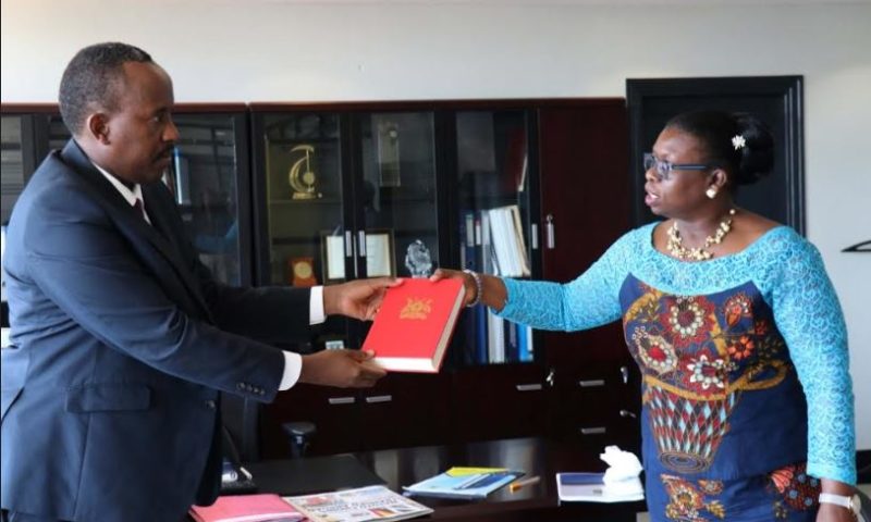 Akol Hands Over Office To New URA Commissioner General Rujoki