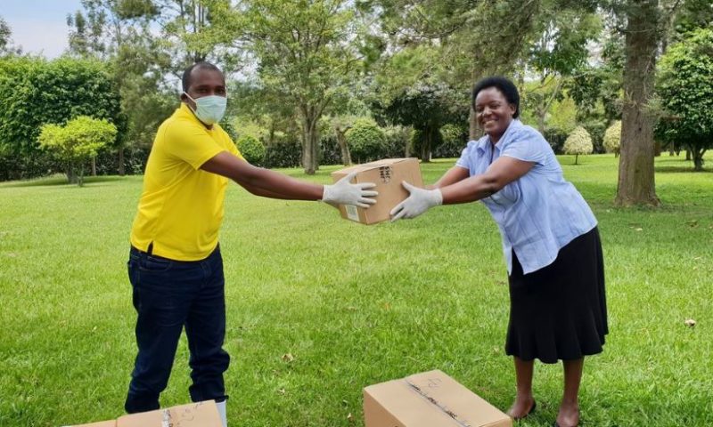 Min. Tumwebaze Boosts Fight Against Coronavirus By Donating Liquid Soap, Safety Gear To Kamwenge People