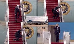 US President Joe Biden Falls Three Times Stumbling Up Stairs Of Air Force One