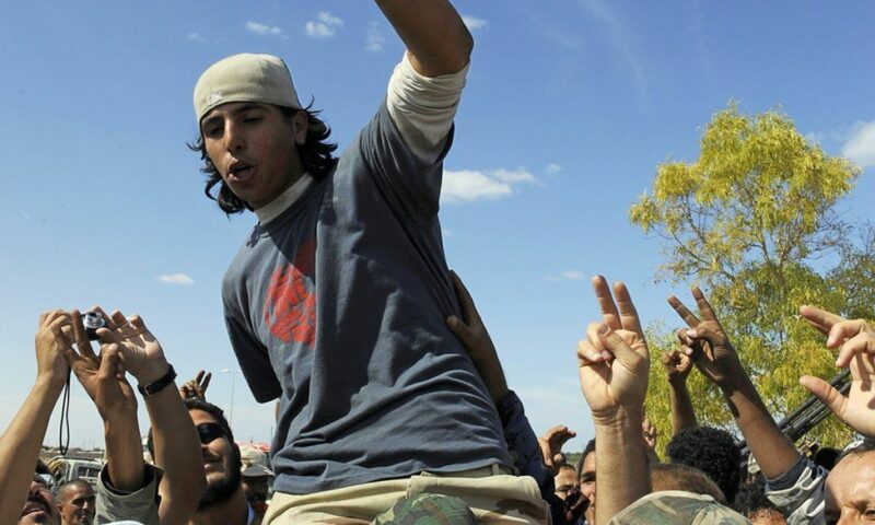 Unearthed! Here Is A 21yr Old Man Who Shot Libya’s Gaddafi But Later Badly Tortured To Death